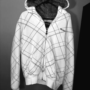 Billabong AM white with grey/black lines.